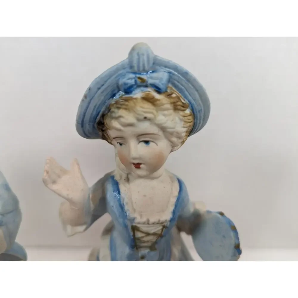 Vintage L & M INC. 8 1/2 '' TALL SET OF TWO BISQUE FIGURINES BOY & GIRL IN BLUE